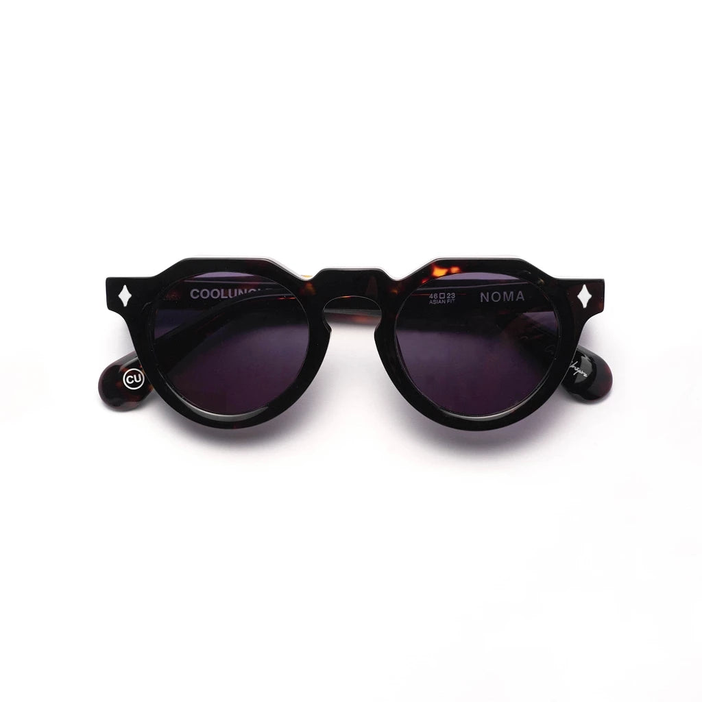 Black sunglasses by Cool Uncle with purple lenses on a white background