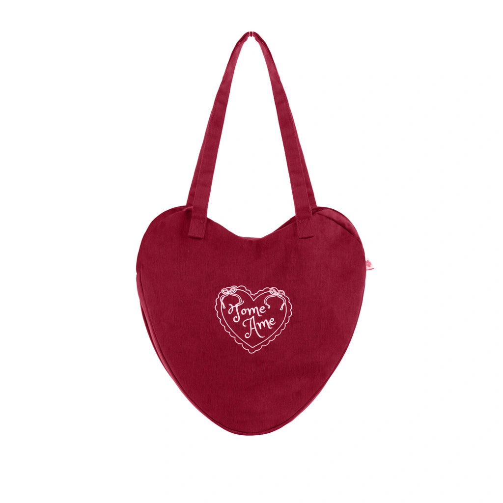 Red heart-shaped bag with 'Tome Ame' text on a white background