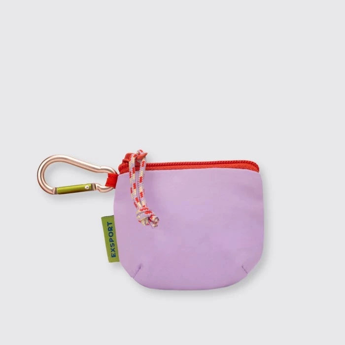 A light purple coin pouch with a multicolor zipper and a carabiner attached to it from Exsport Bags.