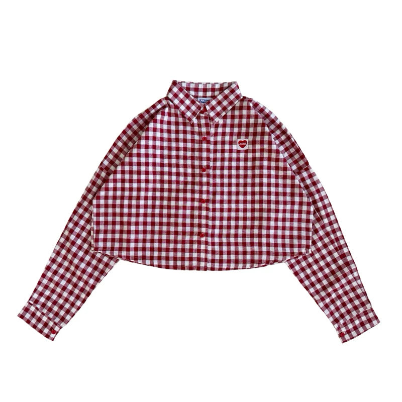 A red and white checkered long-sleeved Brixton shirt by notyourcompany with a collar, button-up front, and a cropped fit.