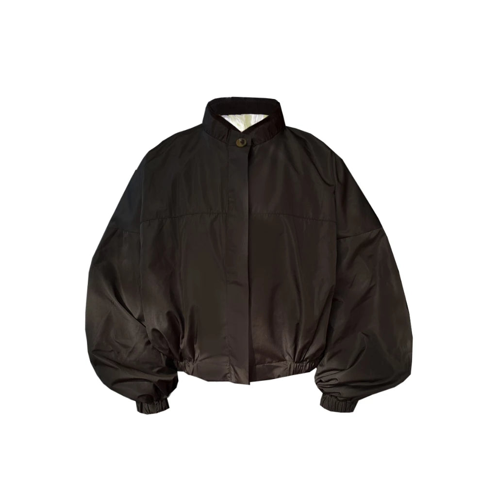 Dark brown volume jacket by Hunting Fields with balloon sleeves on a white background
