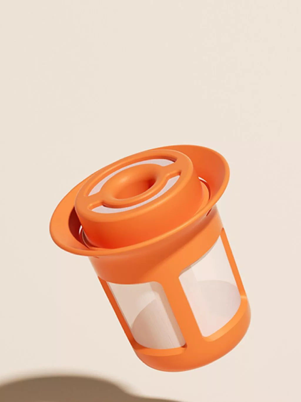 Orange tumblr inner with a clear component on a beige background