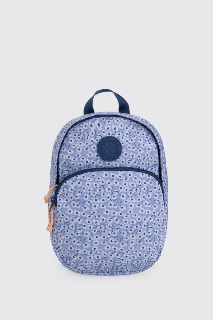 A small blue and white patterned backpack by Exspot Bag with navy blue trim, a top handle, and a circular navy patch on the front, shown against a light gray background.