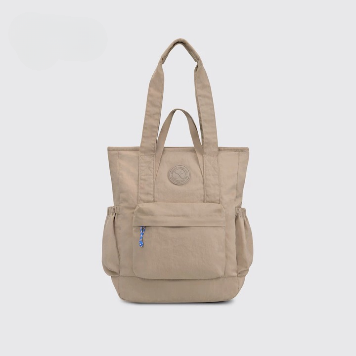 Light brown Exsport Daily Casual Totepack with dual straps, front zipper pocket, and water-repellent nylon material.