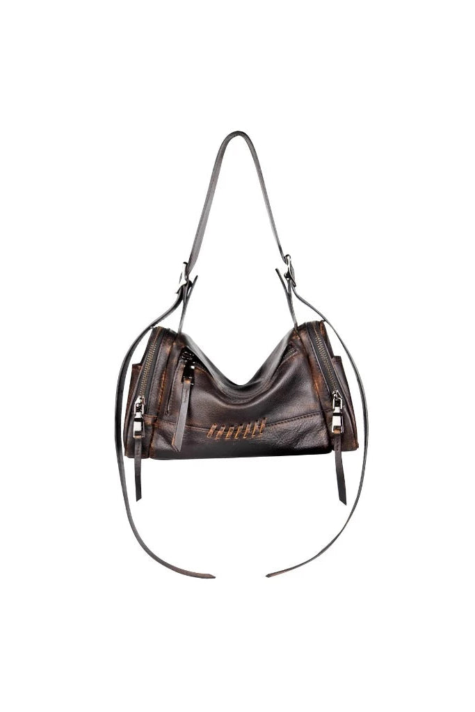 Brown leather handbag with silver zipper and decorative stitching by Peau on a white background