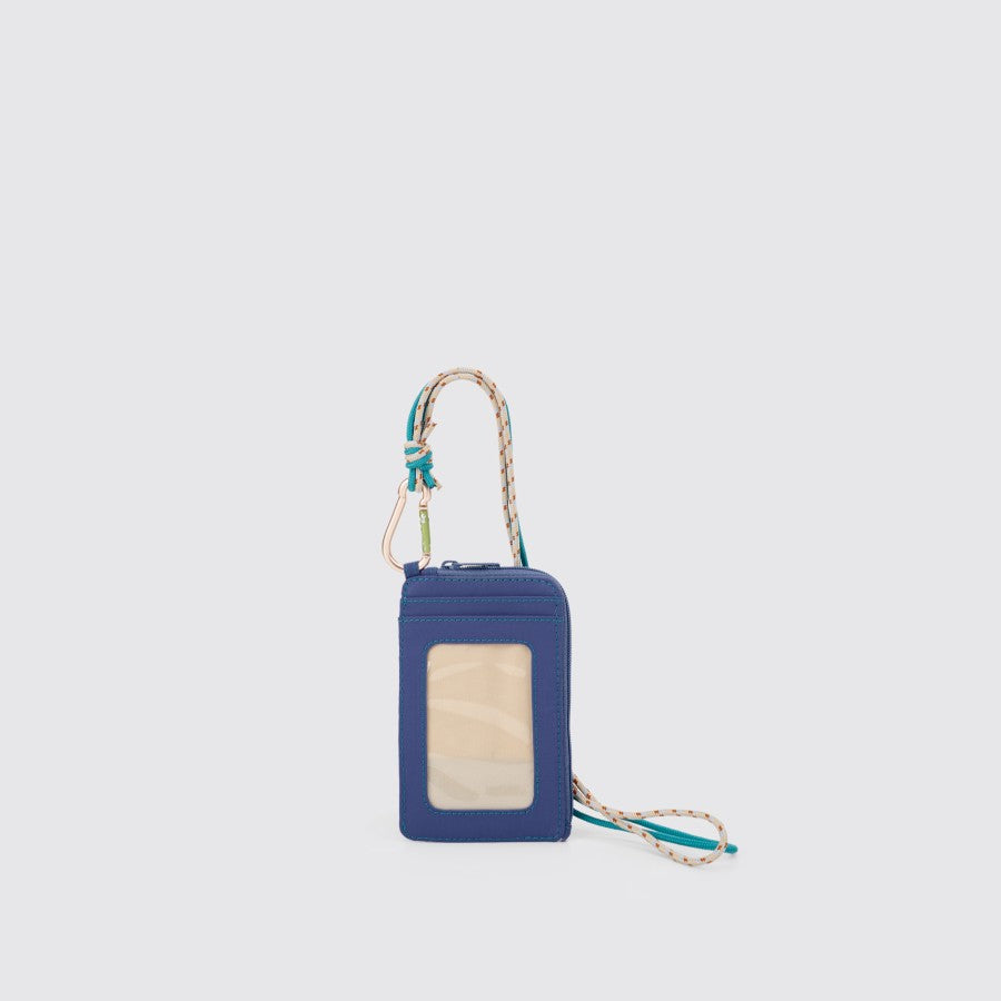A blue nylon lanyard card holder with a cream and light blue strap and a clear front card slot, featuring a carabiner and a 43 cm long neck strap from Exsport Bags.