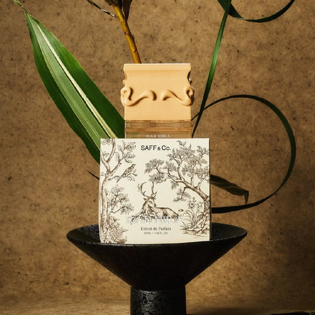 Saff & Co. product packaging with decorative elements on a textured background