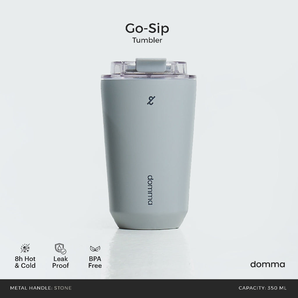 A grey stainless steel insulated travel mug with a Domma brand logo on the front.