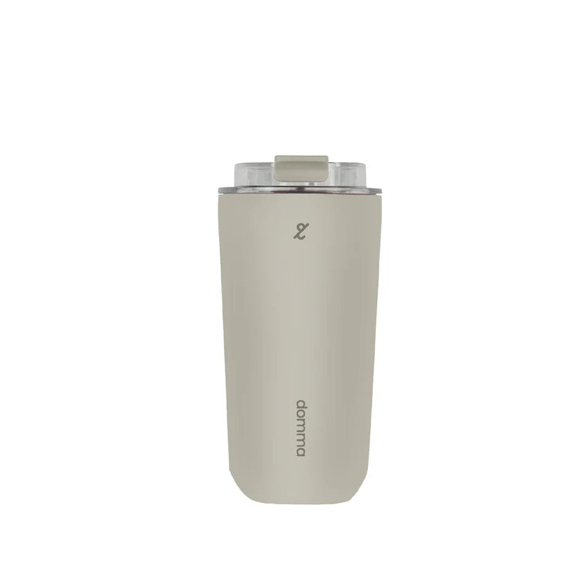A beige stainless steel insulated travel mug with a Domma brand logo on the front.