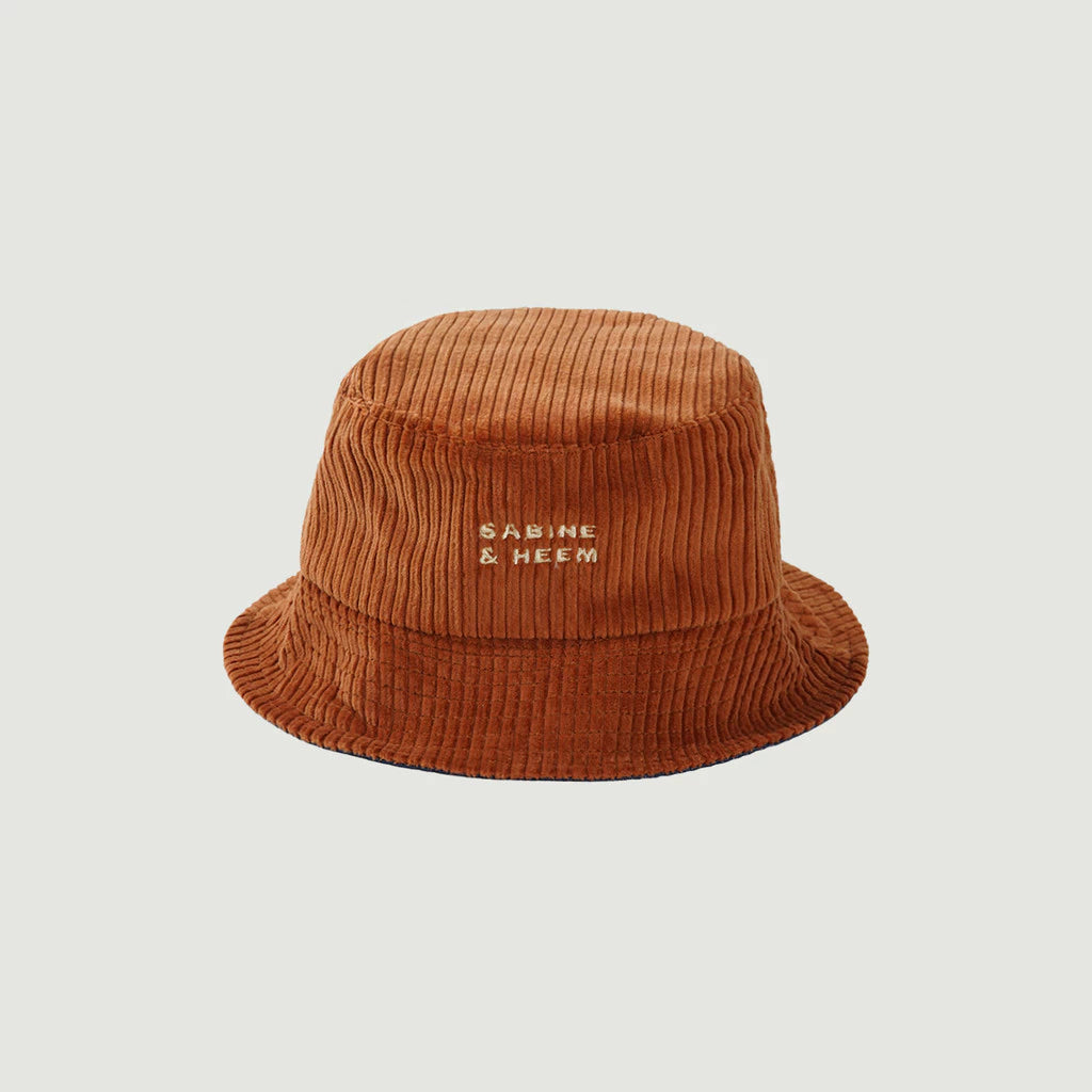 Brown kids bucket hat with 'Sabine & Heem' embroidery on a light gray background