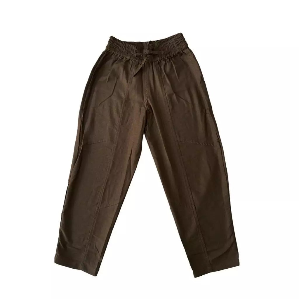 Brown kids barrel pants on a white background
