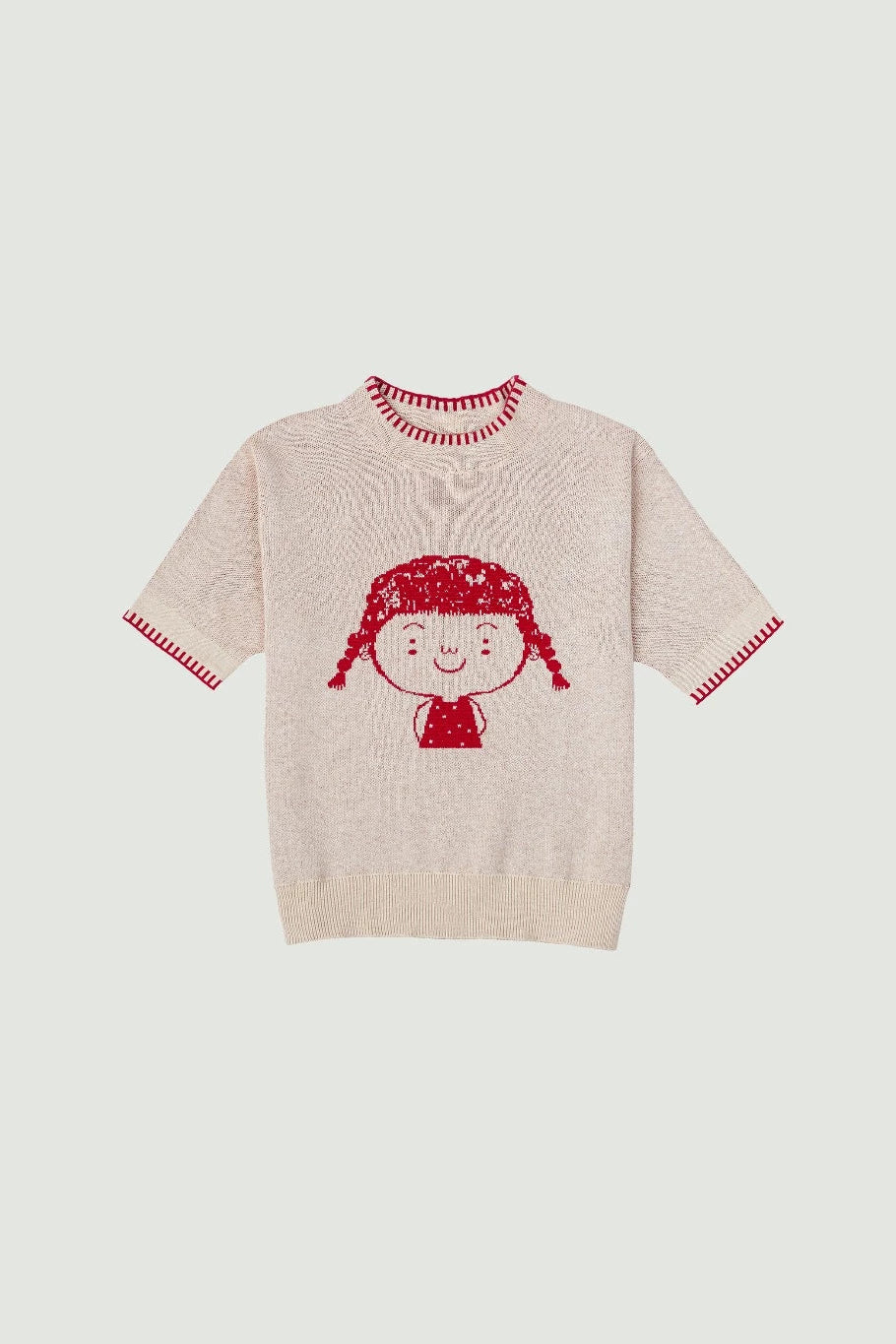 Beige knitted tee with red cartoon design by Sabine & Heem kids clothing on a light gray background
