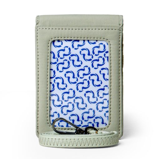 Light green card wallet with a blue and white patterned interior by Wallts on a white background