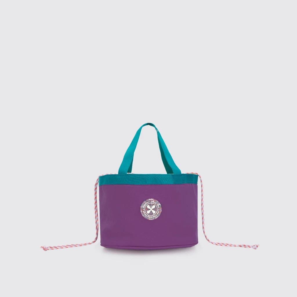 Purple lunch bag with teal top section and red strap from Exsport Bags on a light gray background
