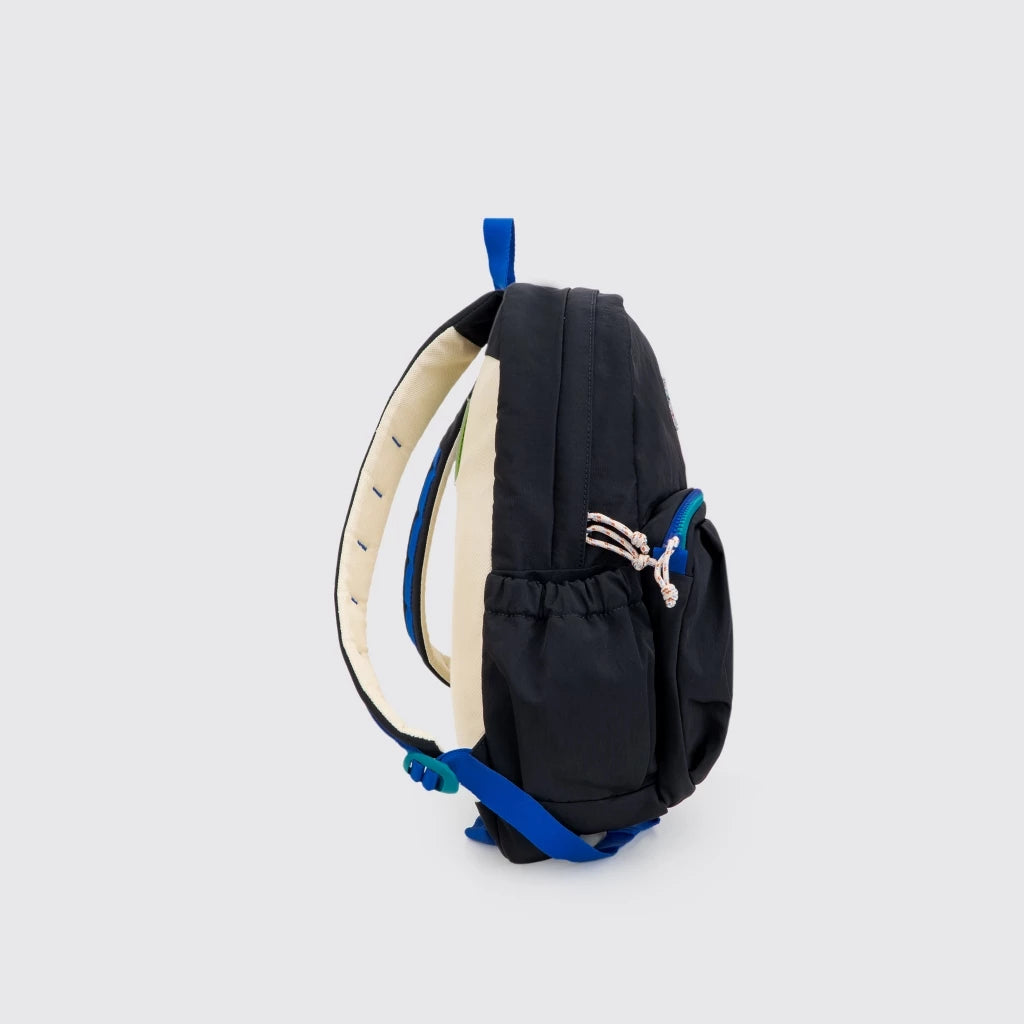 Side view of Exsport Junior Backpack in black with side pocket, blue straps, and padded cream interior.