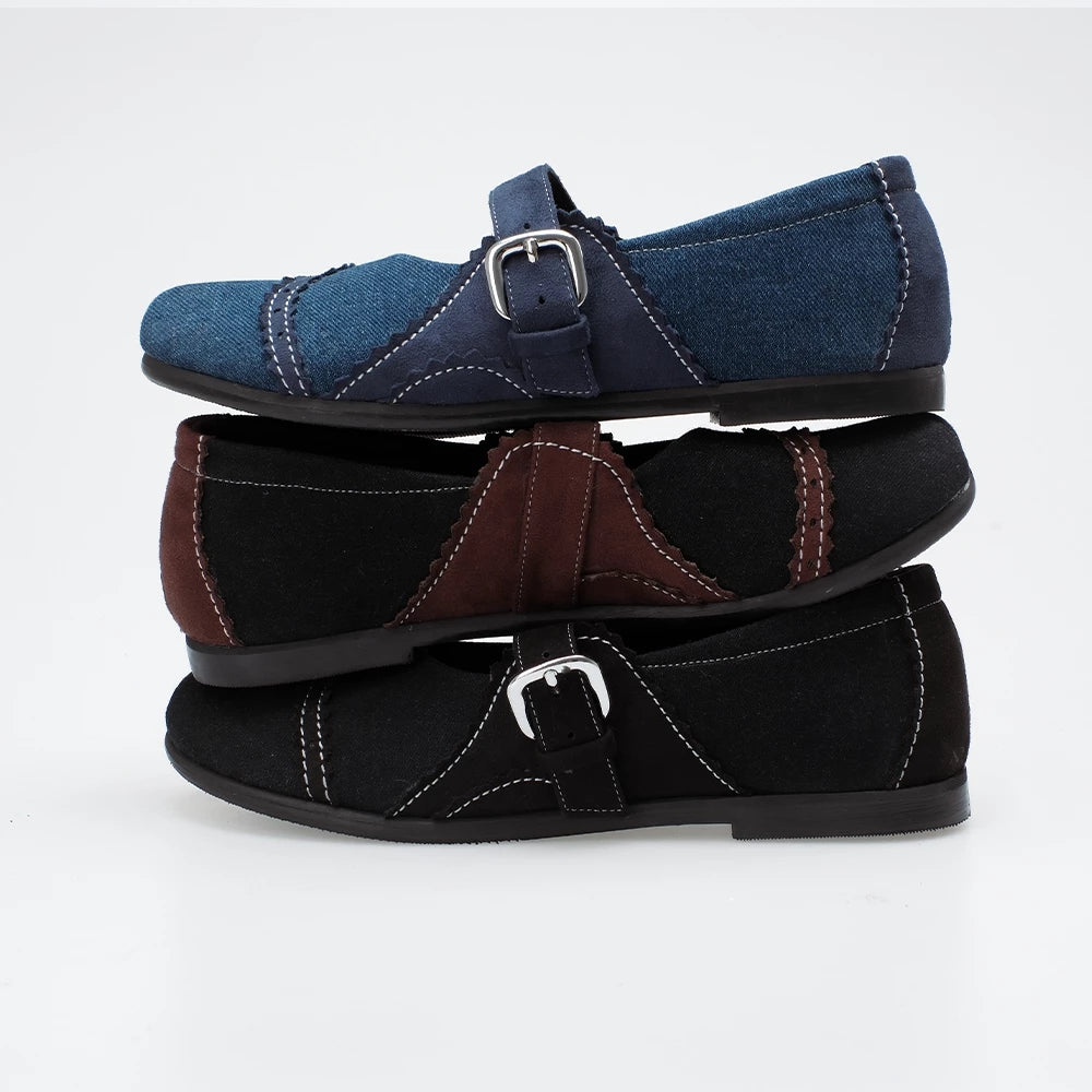 Three pairs of flat shoes in blue, black, and brown on a white background