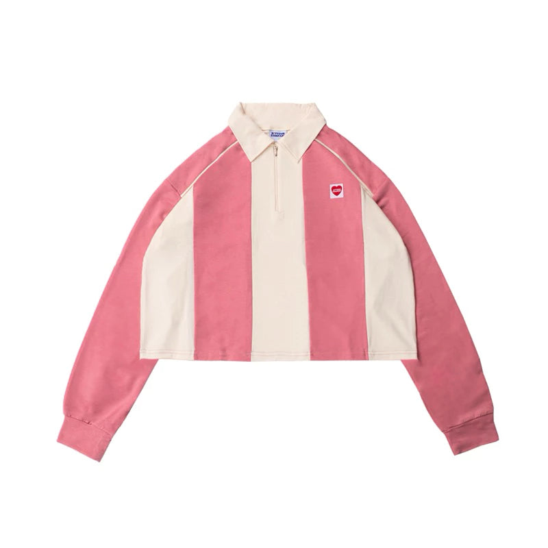 Pink and beige striped shirt with a small heart logo patch by notyourcompany on a white background