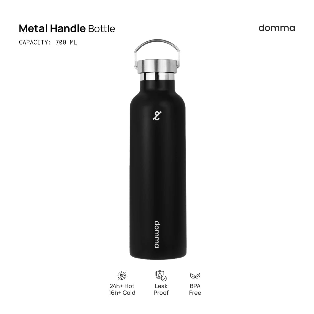 Black metal handle tumbler with domma branding on a white background
