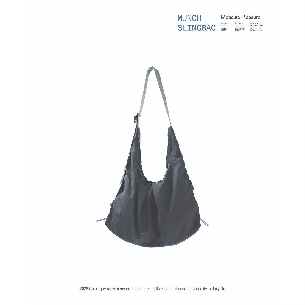 Gray sling bag by Measure Pleasure on a white background with 'MUNCH SLINGBAG' text.