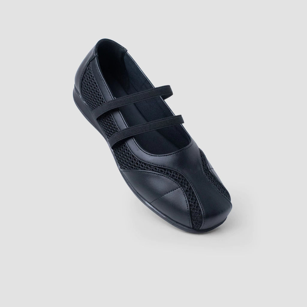 A black mesh Mary Jane style flat shoes by MKS Shoes with a flat sole and loop straps