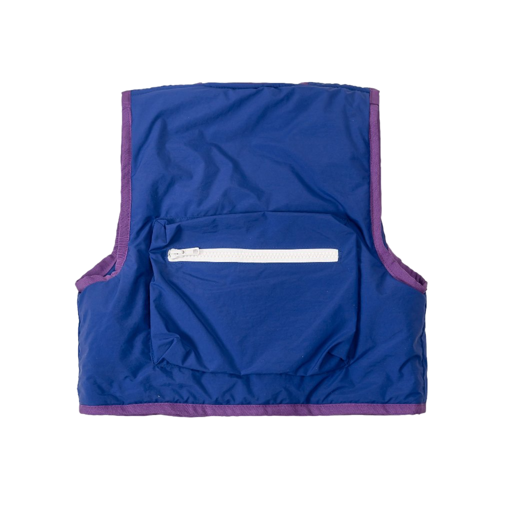 A back view of blue Popsicle Field Vest from Sugacoat Studios with purple lining and white zipper