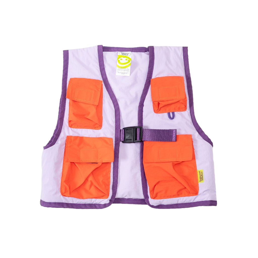 A lilac field vest with multiple orange pockets and a visible brand tag, designed for children.