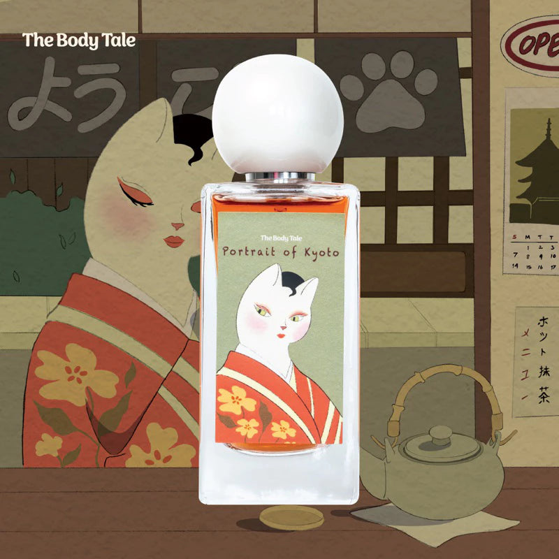 A bottle of 'The Body Tale' perfume with a portrait of a cat in a traditional Japanese outfit on the label, set against a backdrop of a Japanese-style room.