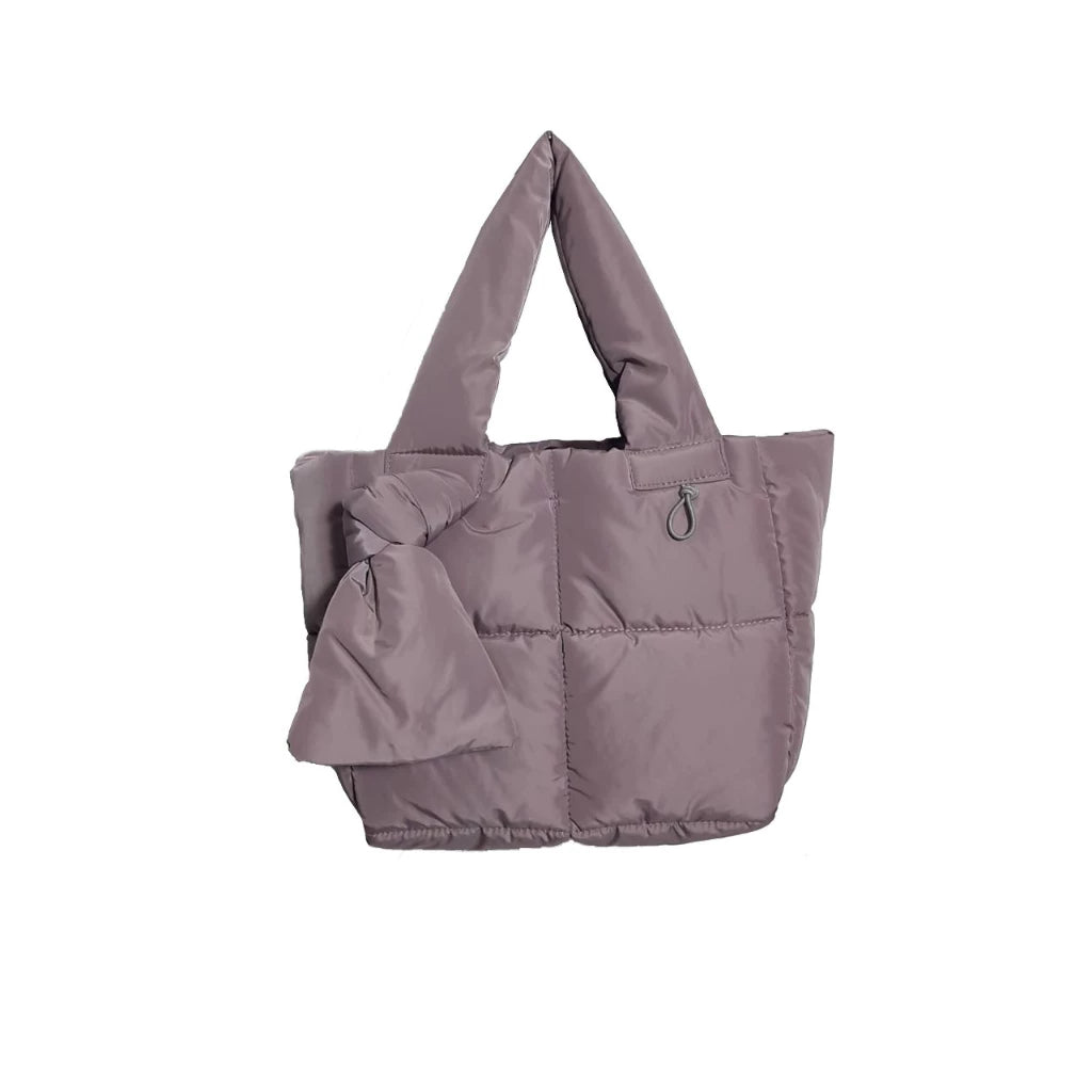 A purple nylon handbag by Hunting Fields.