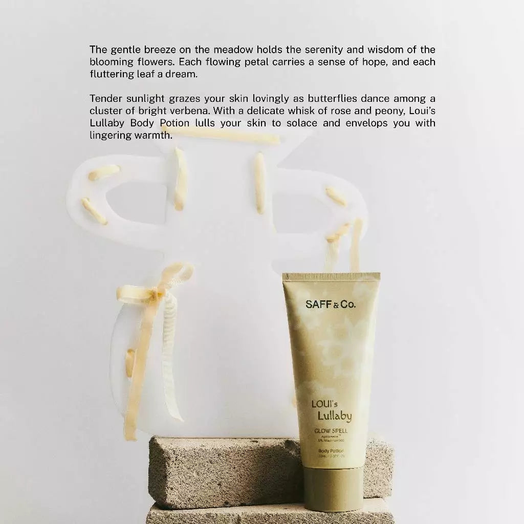 Tube of body lotion with decorative elements on a neutral background and descriptive text
