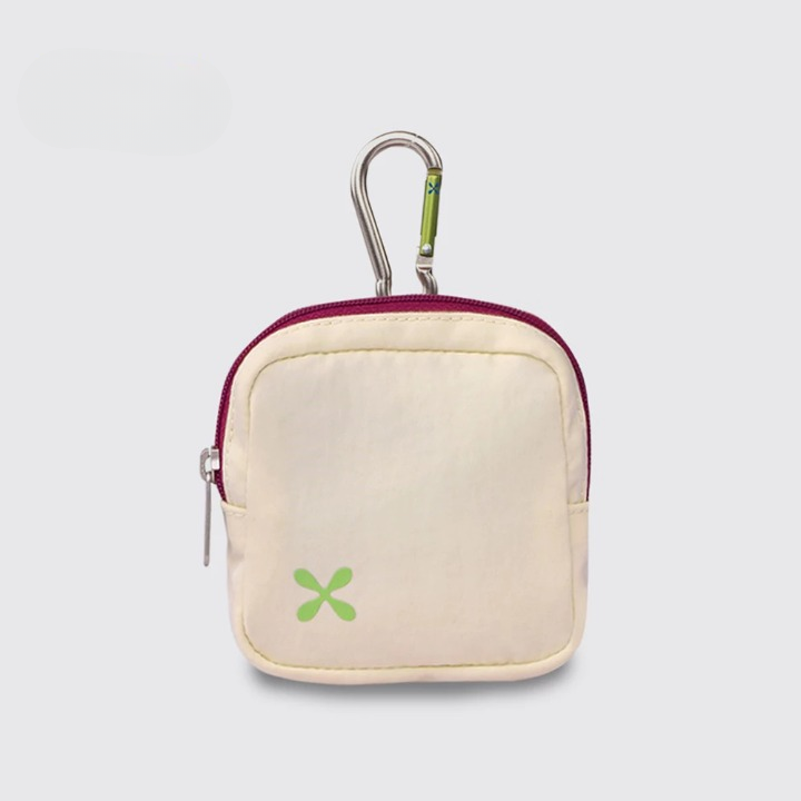 A square-shaped coin pouch with a carabiner clip in the middle, partially unzipped, with a small green logo on the front. The pouch appears to be made of nylon and comes in a cream color.