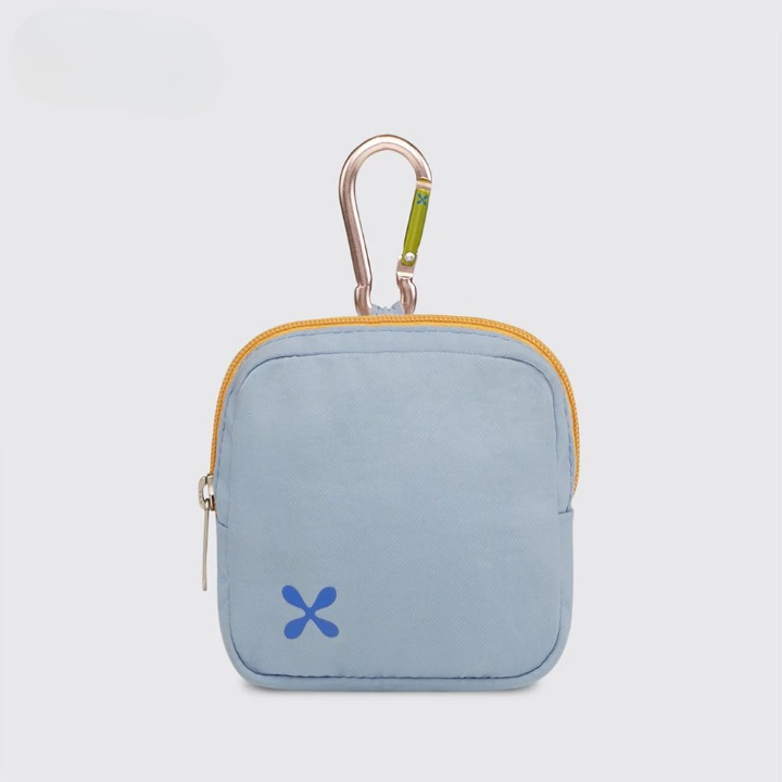 A square-shaped coin pouch with a carabiner clip in the middle, partially unzipped, with a small blue logo of Exsport Bags on the front. The pouch appears to be made of nylon and comes in a light blue color.
