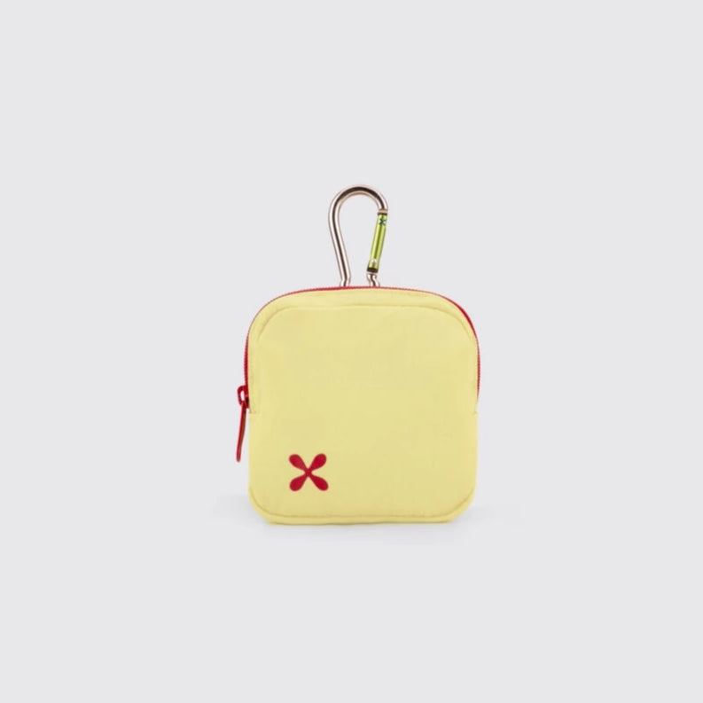 Yellow pouch with a carabiner and purple zipper from Exsport Bags on a light gray background
