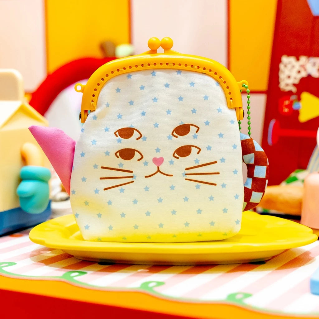 Children's coin purse with cat design on a colorful background