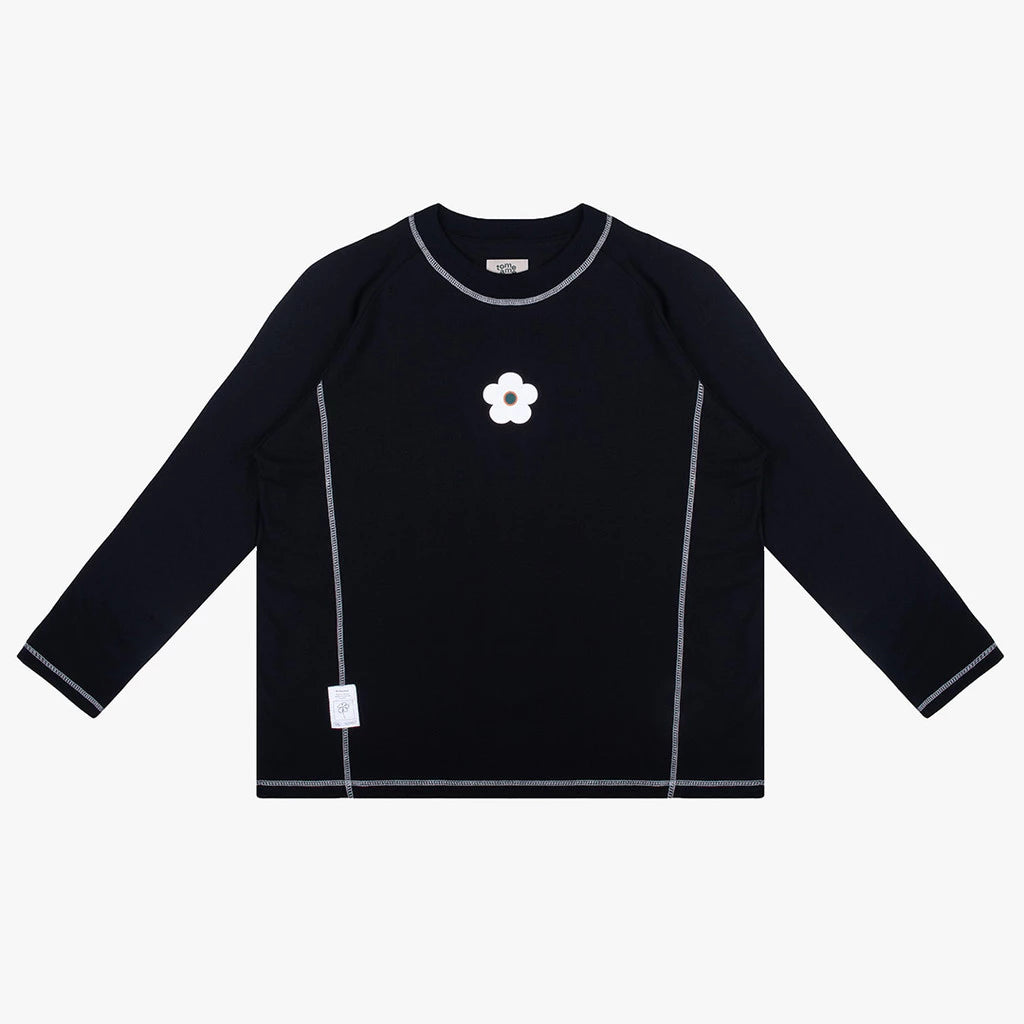 Black long-sleeve tees by Tome Ame with a white flower design on a white background