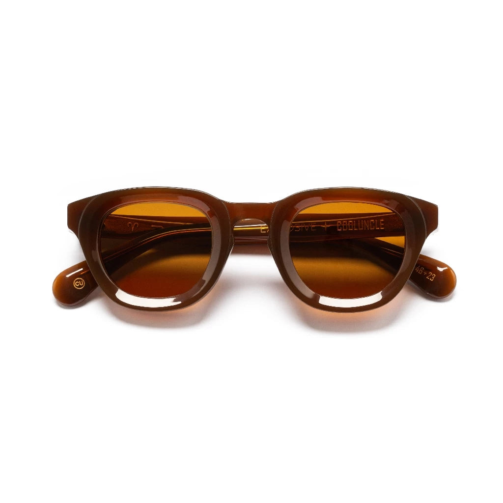 Brown sunglasses by Cool Uncle with a white background