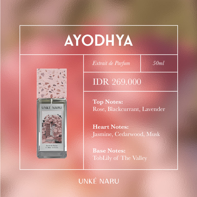 Ayodhya by UNKÉ NARU – 50ml extrait de parfum with floral and woody notes. Features rose, blackcurrant, jasmine, and lily of the valley. Priced at IDR 269,000. Elegant design with terrazzo cap on pink-toned background.