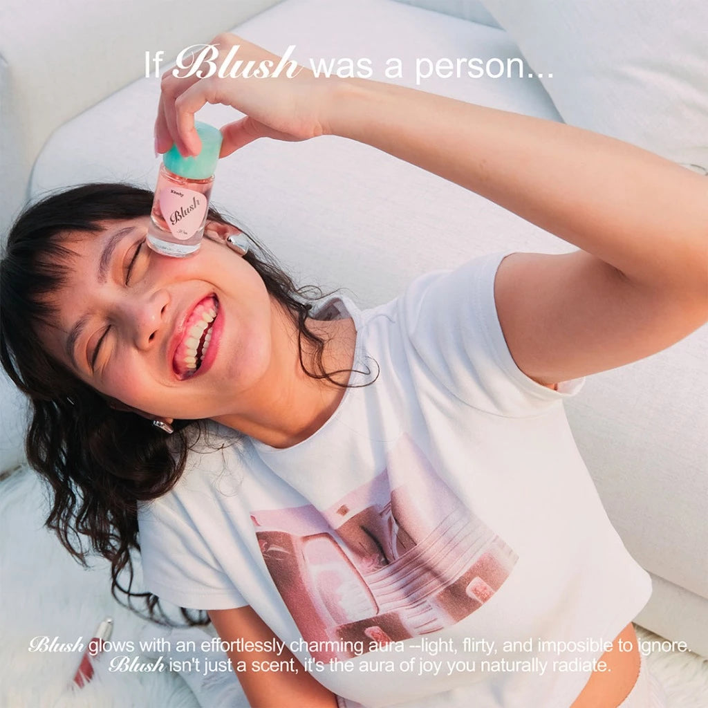 Person holding Blush Extrait De Parfume from Kitschy on a light background
