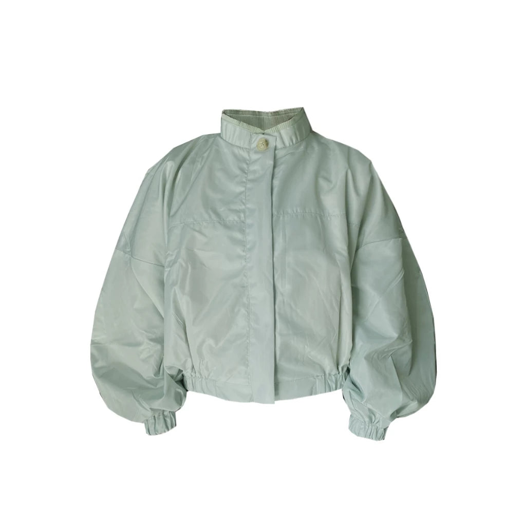Light green volume jacket by Hunting Fields with puff sleeves on a white background