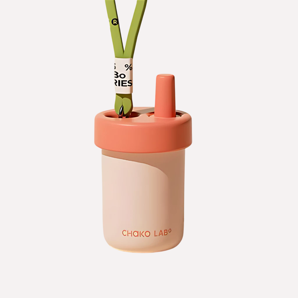 A 485ml pastel-colored Chako Lab vacuum cup with a straw, with a silicone strap.