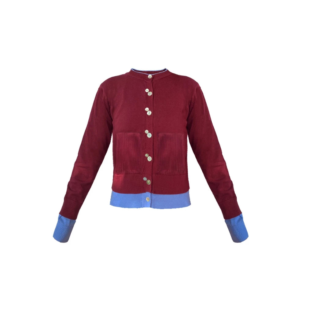 Maroon cardigan by Hunting Fields with blue cuffs and hem on a white background