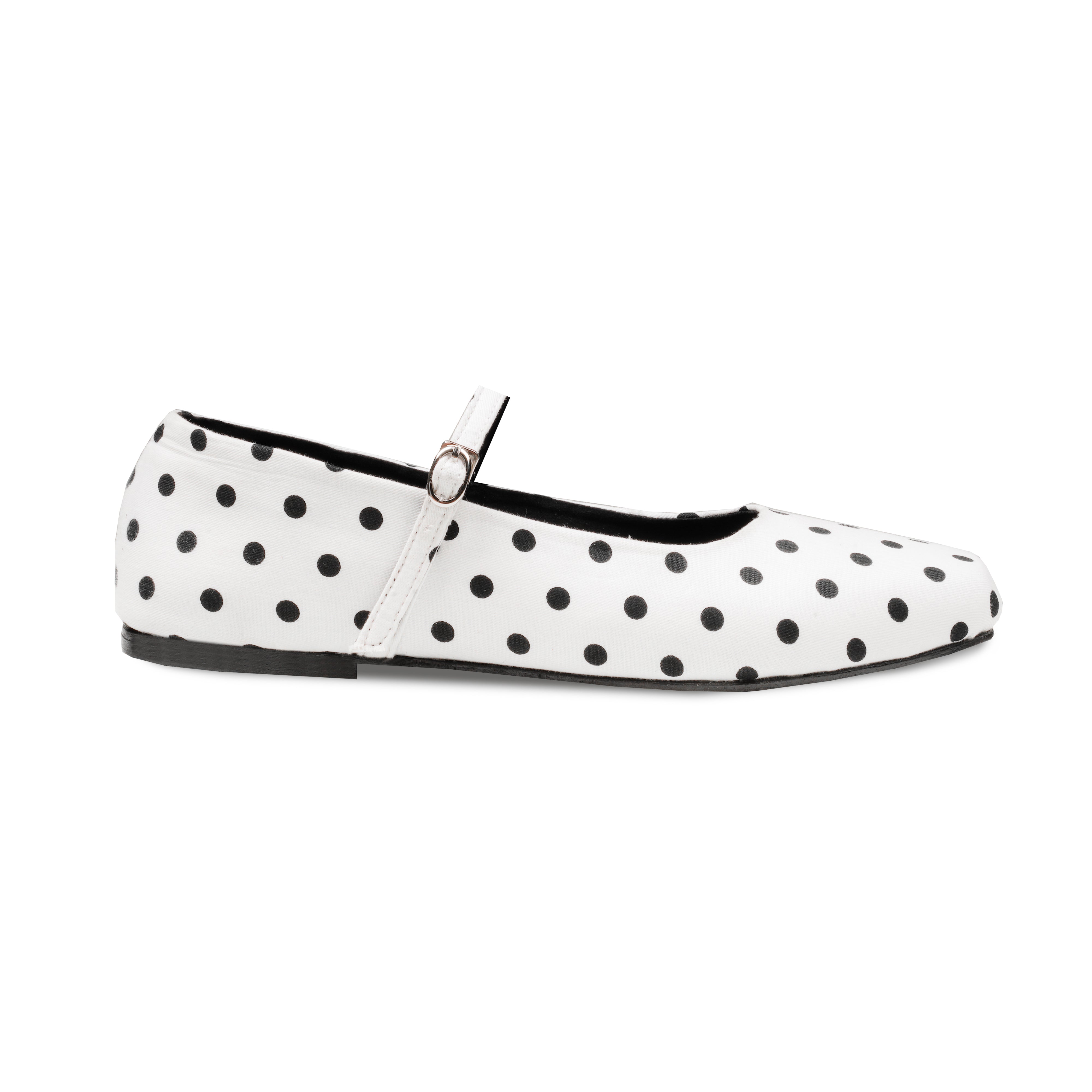 White flatshoe with black polka dots on a white background