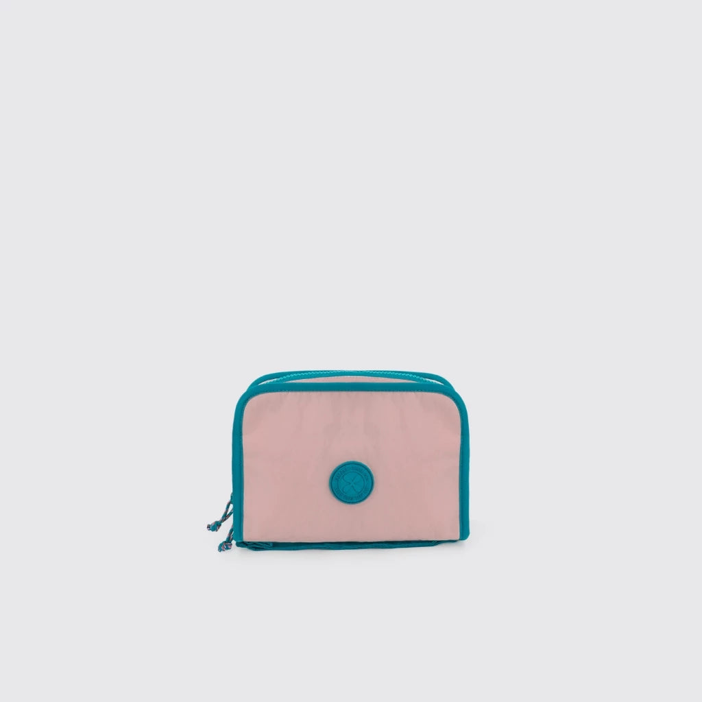 Light pink Export Bags Everyday Multipurpose Pouch with tosca zipper on a light gray background