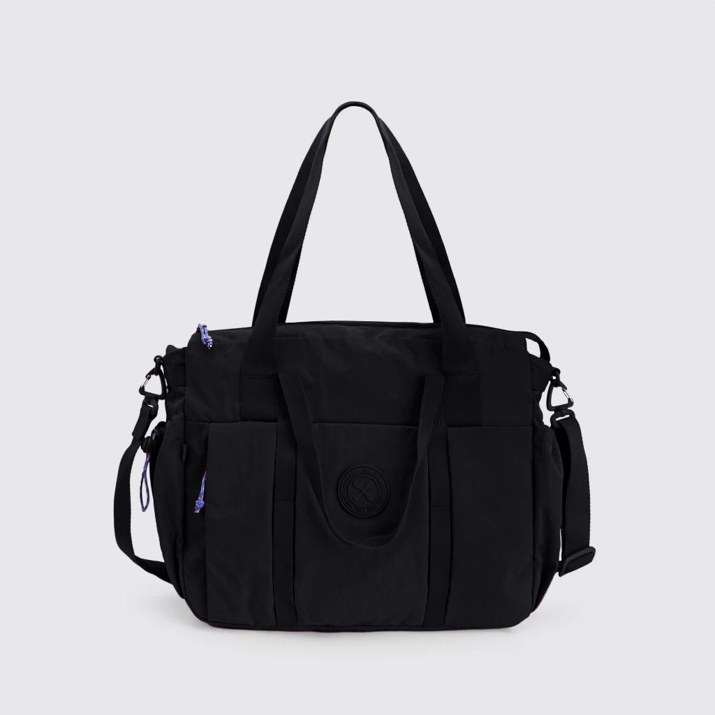 Black travel bag by Exsport with multiple pockets and straps on a light gray background