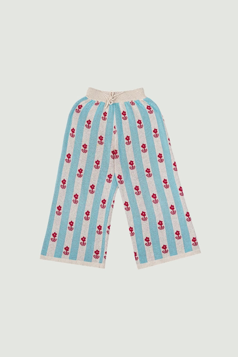 Cotton knitted pants with blue stripes and red floral pattern by Sabine & Heem kids clothing on a light gray background