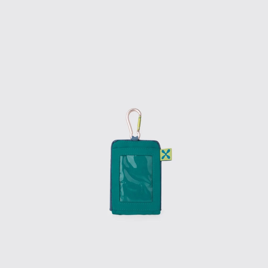 Teal keychain pouch by Exsport with a carabiner on a light gray background
