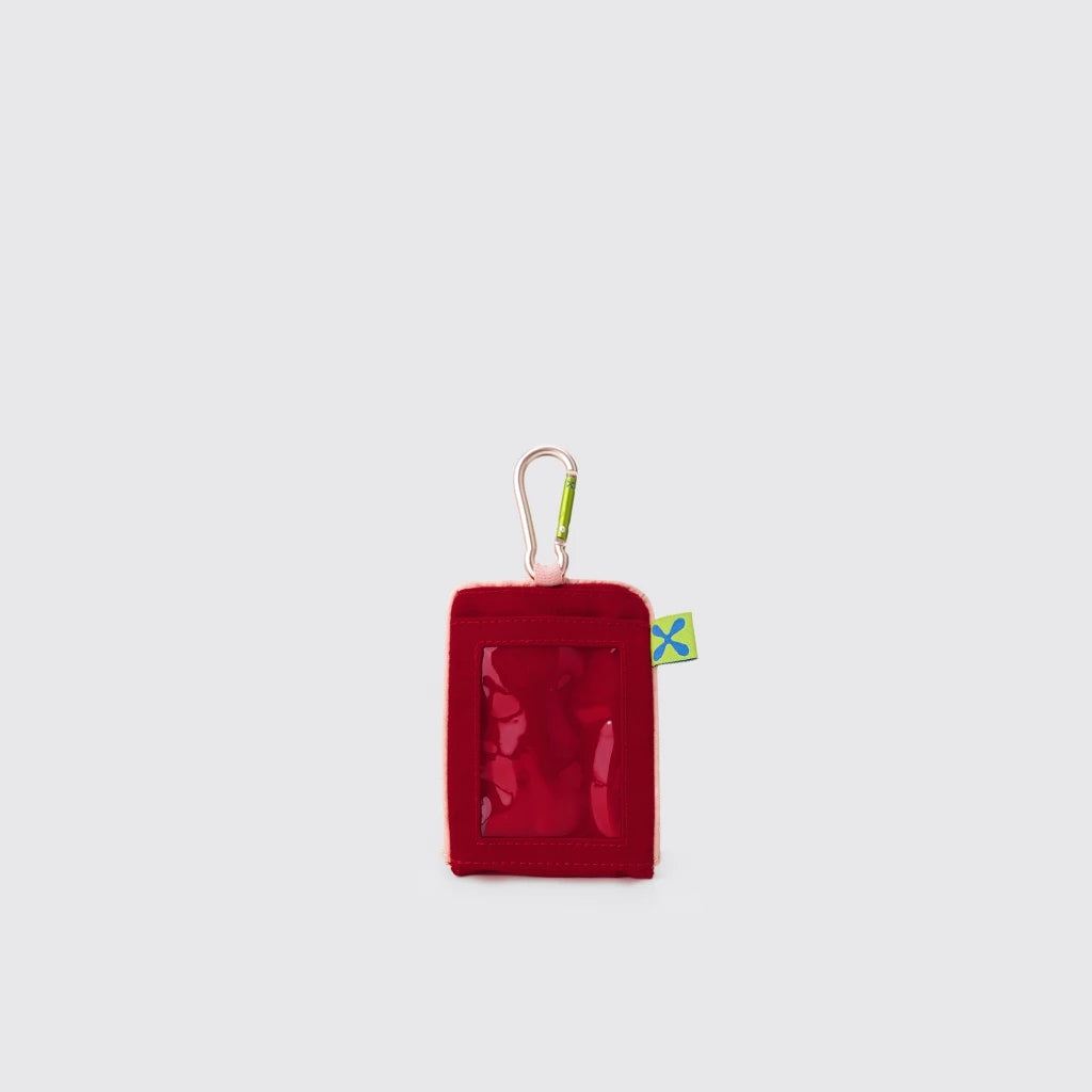 Red pouch by Exsport with a carabiner on a light gray background
