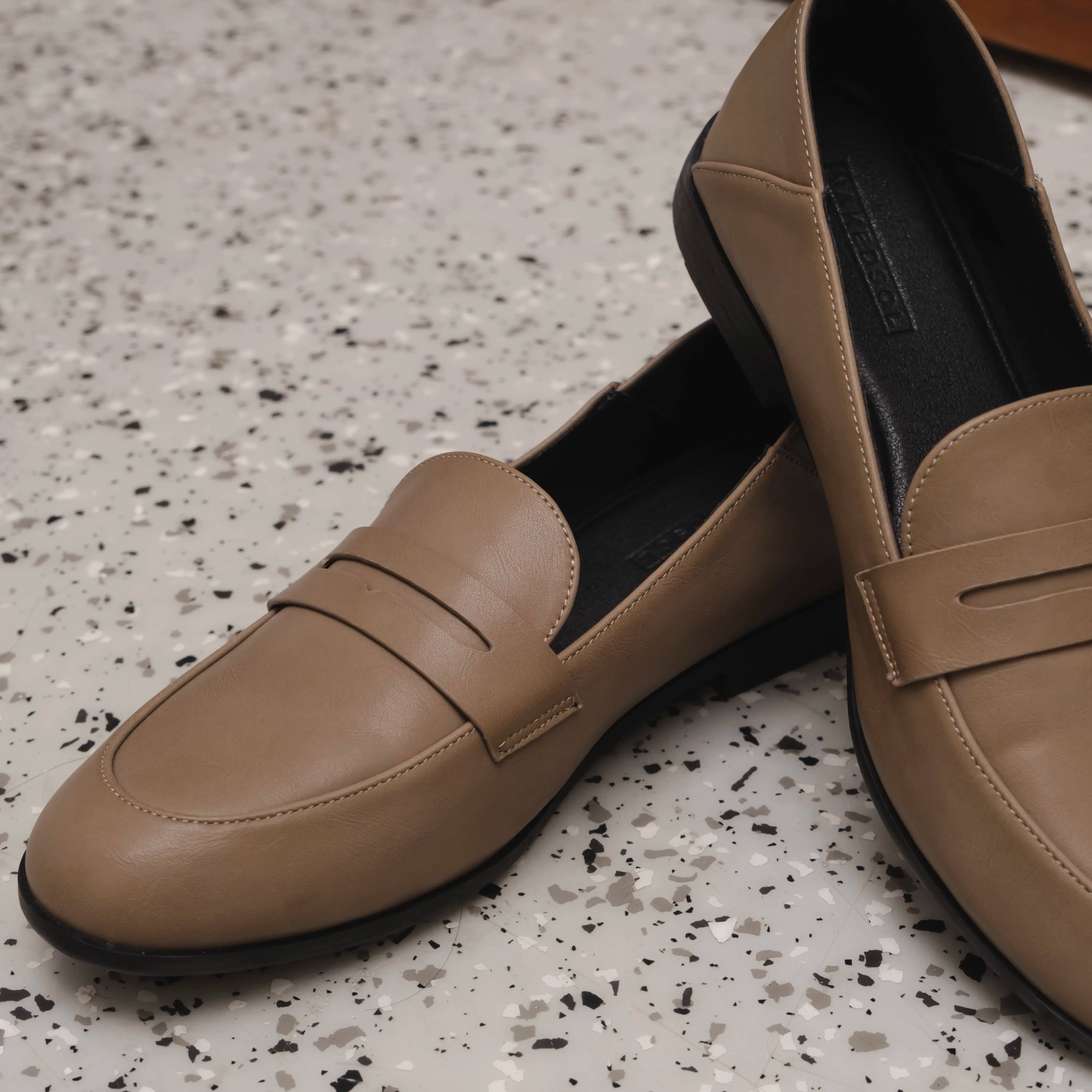 Women’s light brown loafers flat shoes with minimalist design, perfect for office wear and casual style.