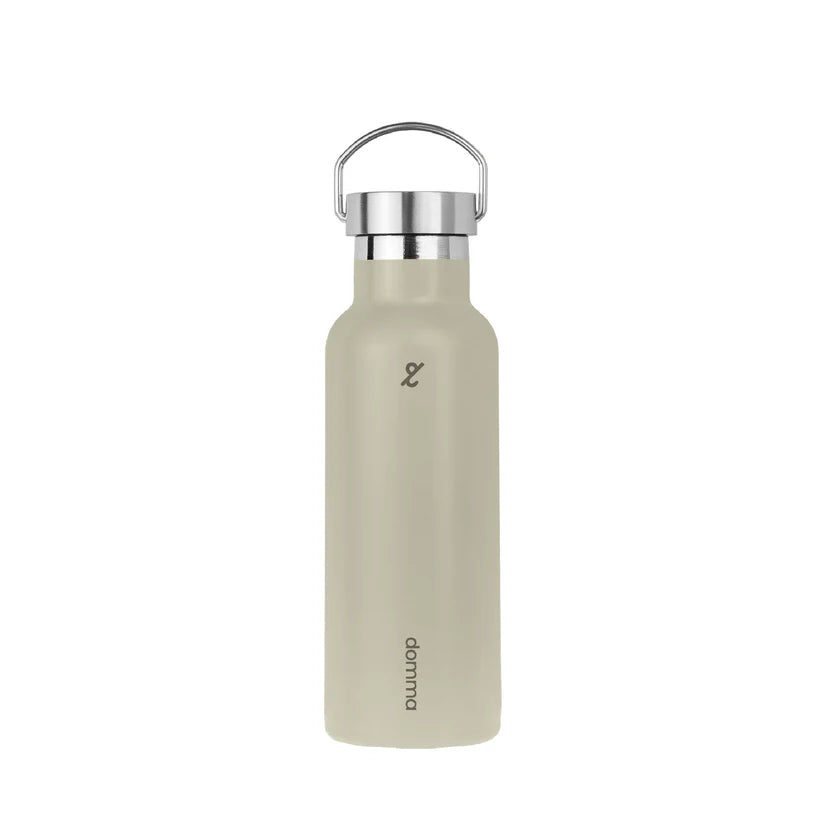 Beige tumbler with silver cap by Domma on a white background