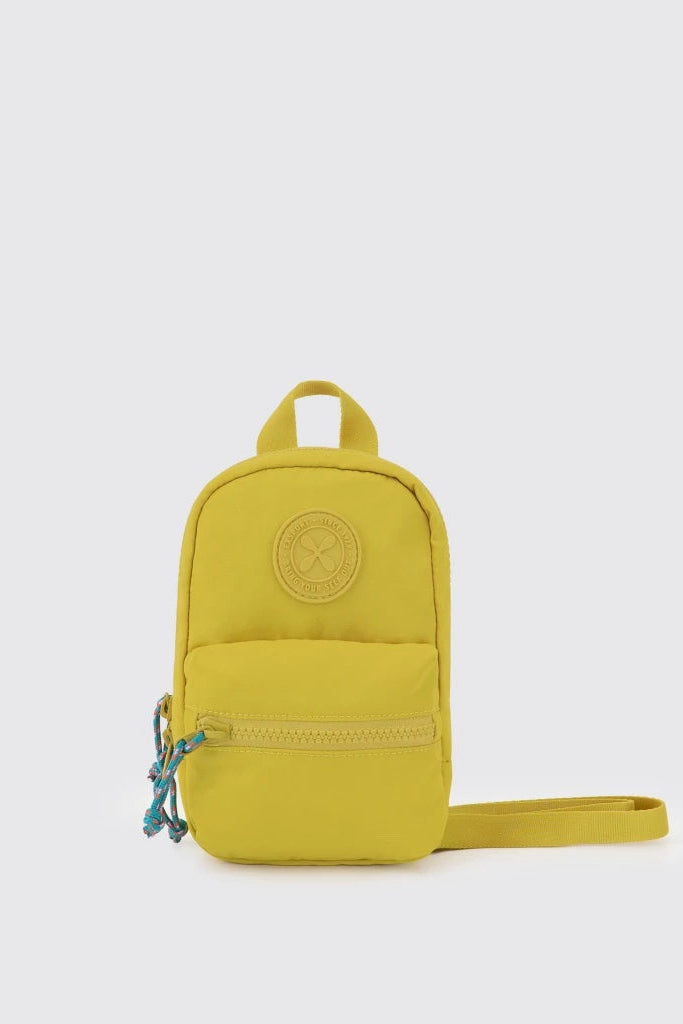 Yellow mini crossbody bag by Exsport Bag on a light gray background