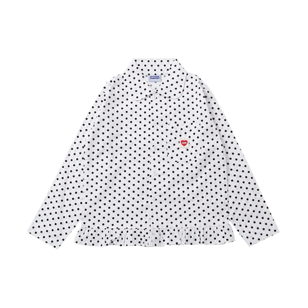 White polka dot shirt with a small red heart logo patch by notyourcompany on a white background